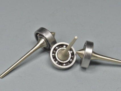 B797 - Micro spinning tops with ball bearings